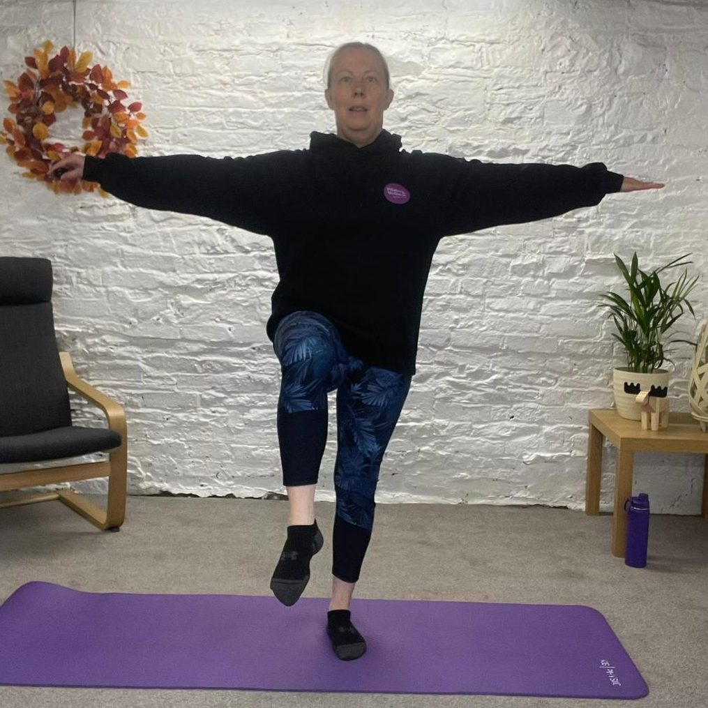 Rebecca is demonstrating a pilates move from her virtual studio, based in Chapeltown, Sheffield.